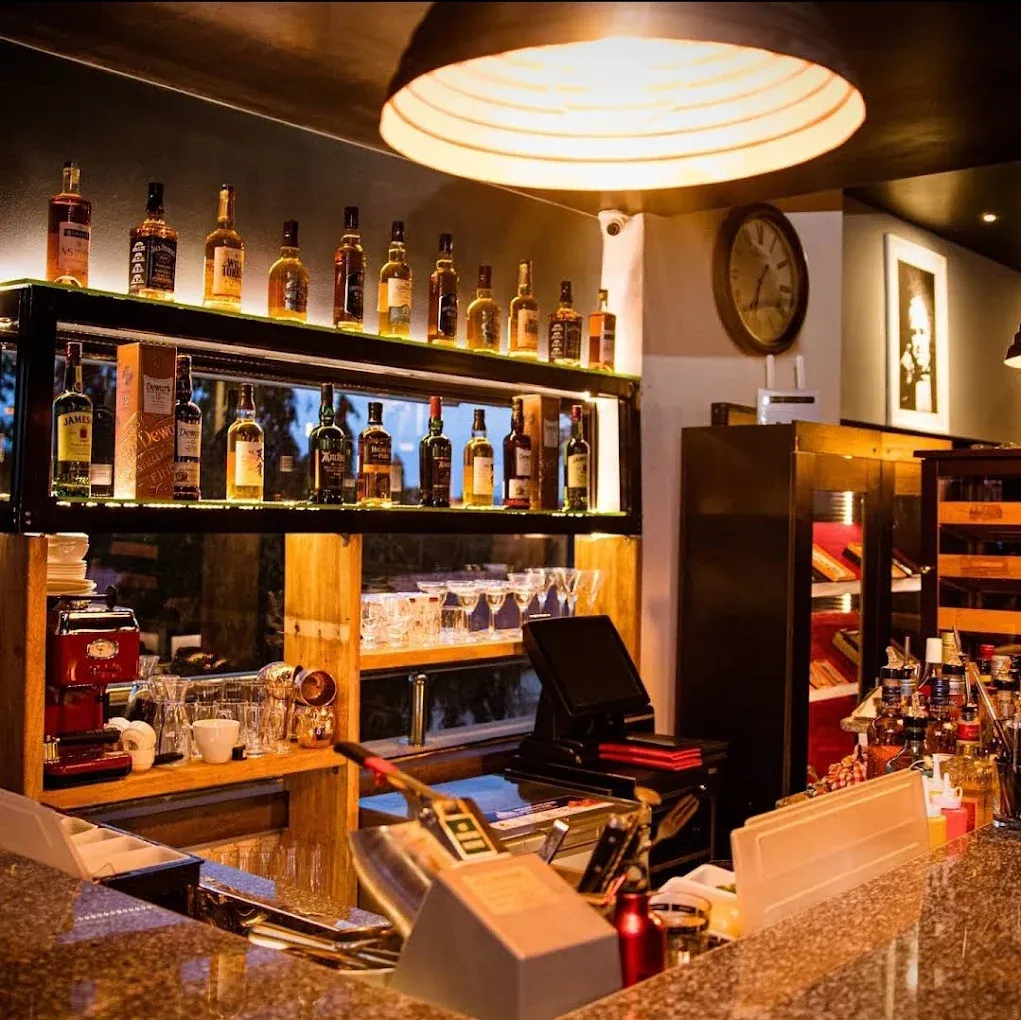 Hustlers Whiskey & Cigar Lounge Cover Image